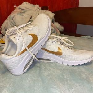 White Nike tennis shoes